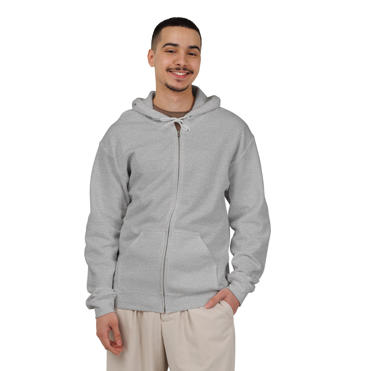 A man wearing a light gray zip-up hoodie with a drawstring hood and kangaroo pockets, paired with beige pants, standing against a solid white background. Shop Keep Shining Typography Script Graphic Zip Hoodie Casual Wear for an eye-catching, easy-to-layer look that adds positivity to your wardrobe. Express your style with the Keep Shining Typography Script Graphic Zip Hoodie, a versatile layer featuring an uplifting graphic statement. Keep Shining Typography Script Graphic Zip Hoodie delivers cozy comfort.