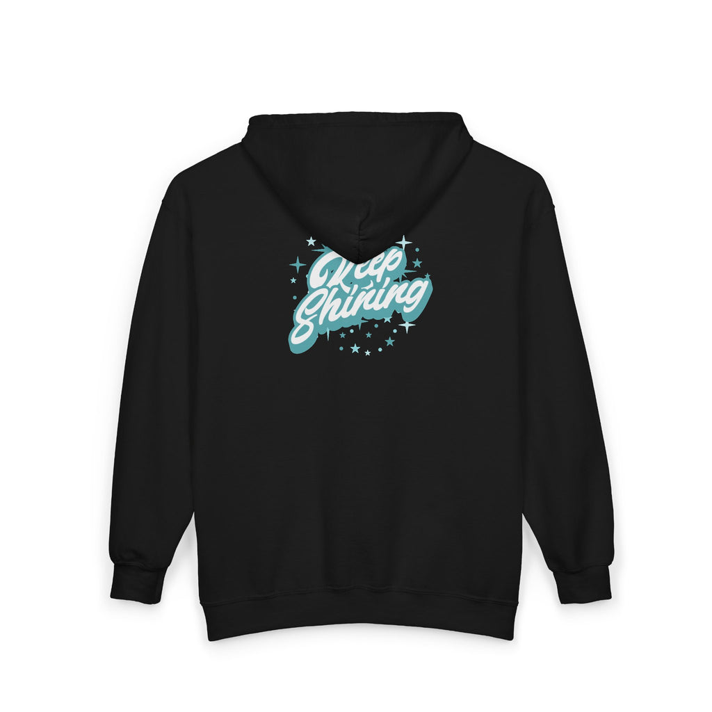 A black zip-up hoodie shown from the back, featuring a graphic print of the words 'Grass Shining' in a stylized light blue and white script with small star accents. Shop Keep Shining Typography Script Graphic Zip Hoodie Casual Wear for an eye-catching, easy-to-layer look that adds positivity to your wardrobe. Express your style with the Keep Shining Typography Script Graphic Zip Hoodie, a versatile layer featuring an uplifting graphic statement.